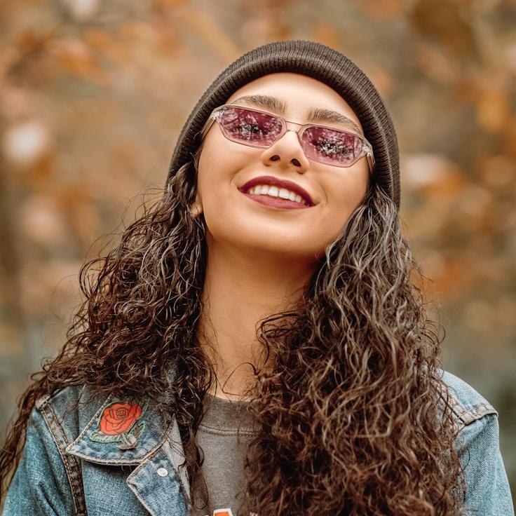 Kaveri Mehta, Lead Design Curator at North Bridge Hub, reviewing corporate floral arrangements